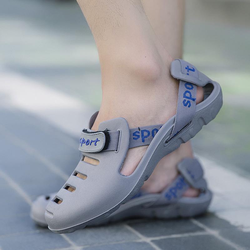 

Summer Korean version of men s trendy cool slippers drag non-slip large size pinch shoes beach shoes Vietnamese massage soft-soled slippers men 45 серый