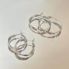 Elegant Silver Hoop Earrings with Unique Design for Women