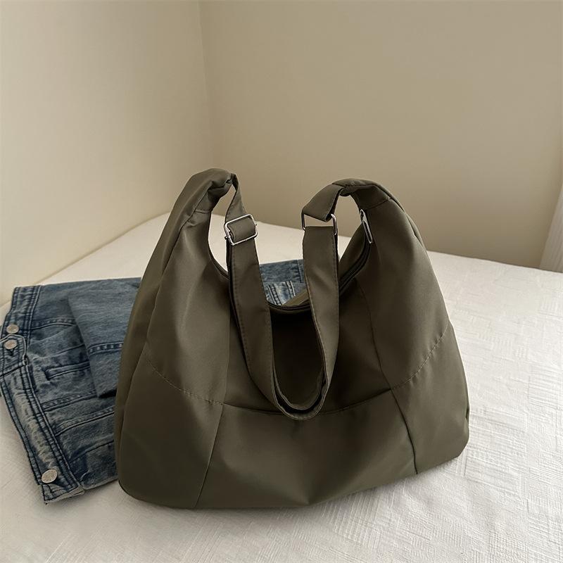 

Студенты колледжа ездят на занятия Однотонная персонализированная сумка-тоут Женская универсальная повседневная сумка-мессенджер в трендовом стиле личности зелёный