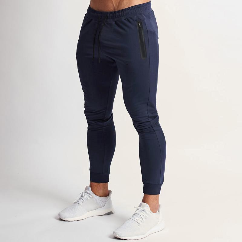 Frühling und Sommer Neue einfarbige Fitnesshose Lässige elastische Sporthose Herrenmode