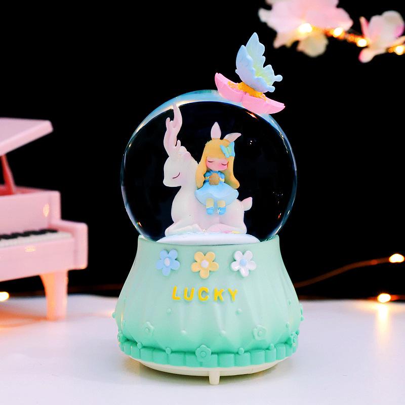 Iridescent Castle Snowfall Crystal Ball Music Box for Kids - Dreamy Fairy Tale Carriage.