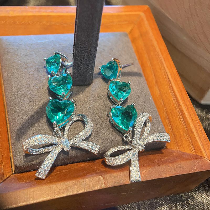 

Модные серьги-бантики в форме персикового сердца Han Fan Популярные ювелирные серьги-гвоздики Цветной циркон Yiwu