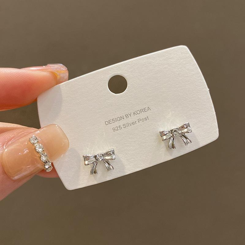 Korean version of small silver bow stud earrings femininity simple personality Internet celebrity earrings sleep free earrings