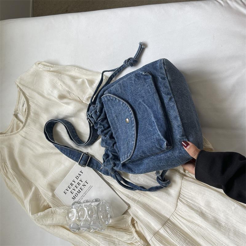 

Women s bag cute cloth bag literary small bag women 2025 new summer simple fashion Internet celebrity casual bucket messenger bag светло-синий