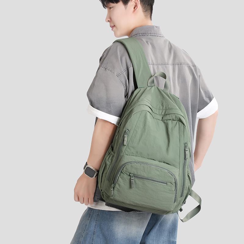 Ryggsäck i enfärgat dam lätt utomhusryggsäck stor kapacitet student skolväska