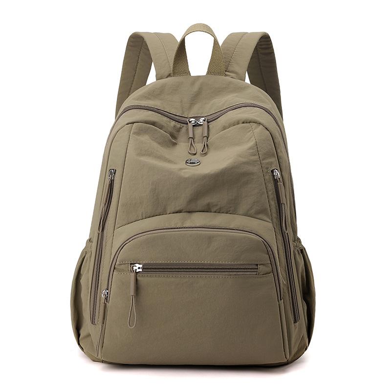 High-value solid color Korean version of the new popular simple fashion versatile light Japanese commuting travel backpack women