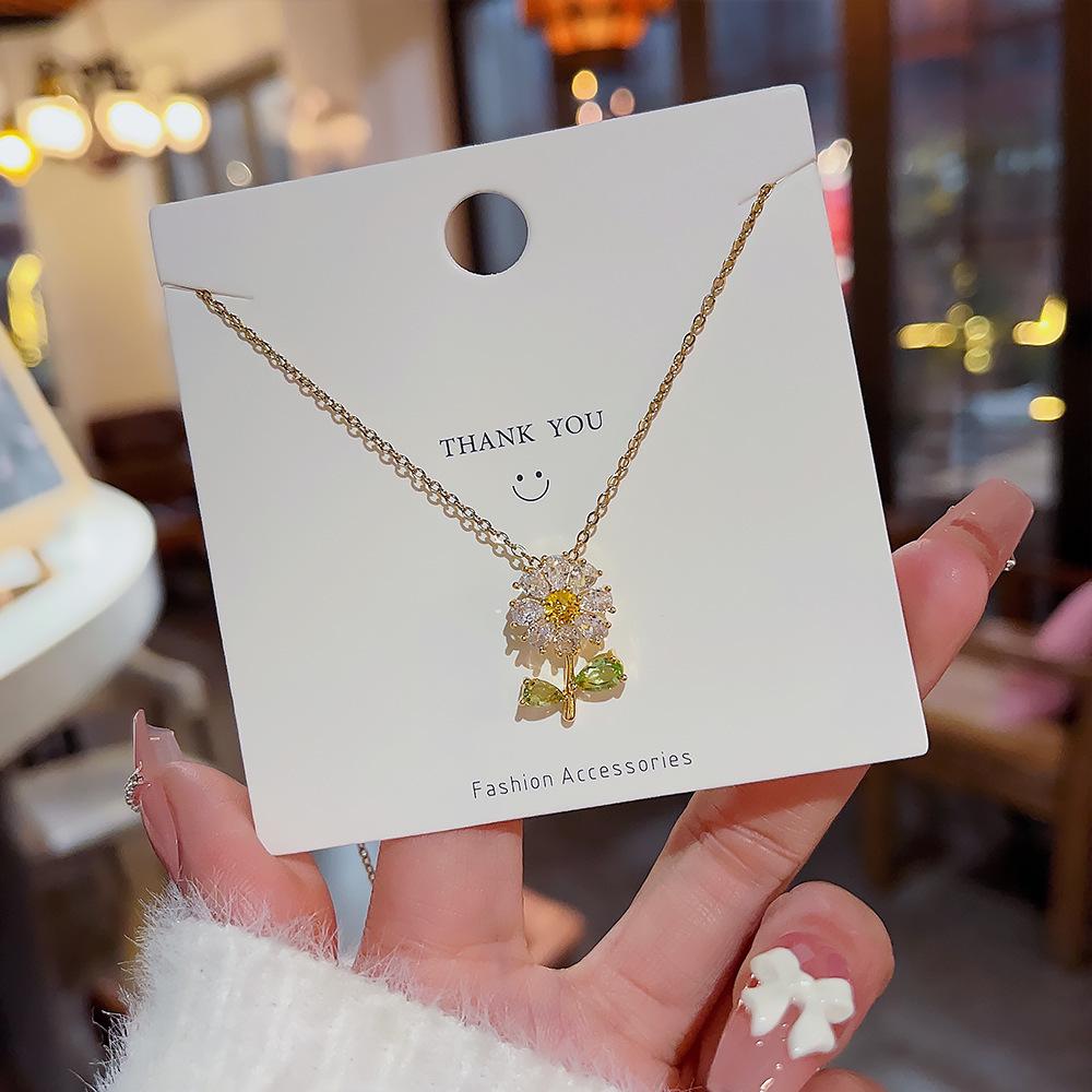 Korean Zircon Flower Pendant Titanium Necklace: Elegant, Retro, and Luxurious Women's Clavicle Chain