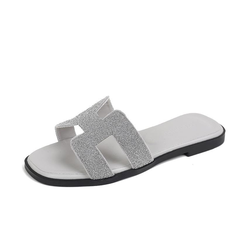 

Стразы тапочки женская обувь 2025 новый летний модный универсальный плоская подошва одно слово пляжные дорожные сандалии 43