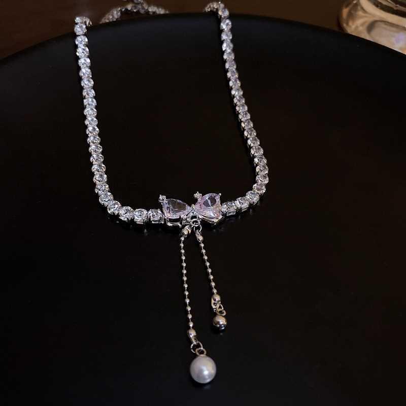 

Женское жемчужное ожерелье-бантик: Универсальный роскошный дизайн ключицы, новый стиль 2023 г.