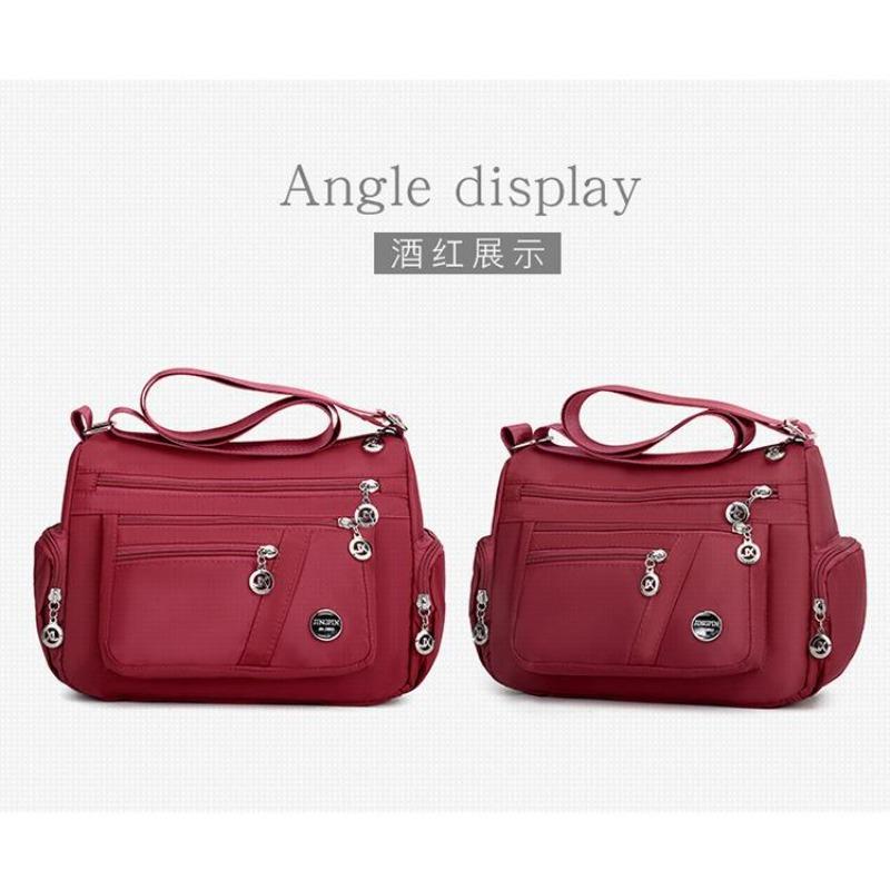 Women s bag Multi-compartment casual shoulder messenger bag Fashion women s bag Large capacity messenger bag Nylon cloth