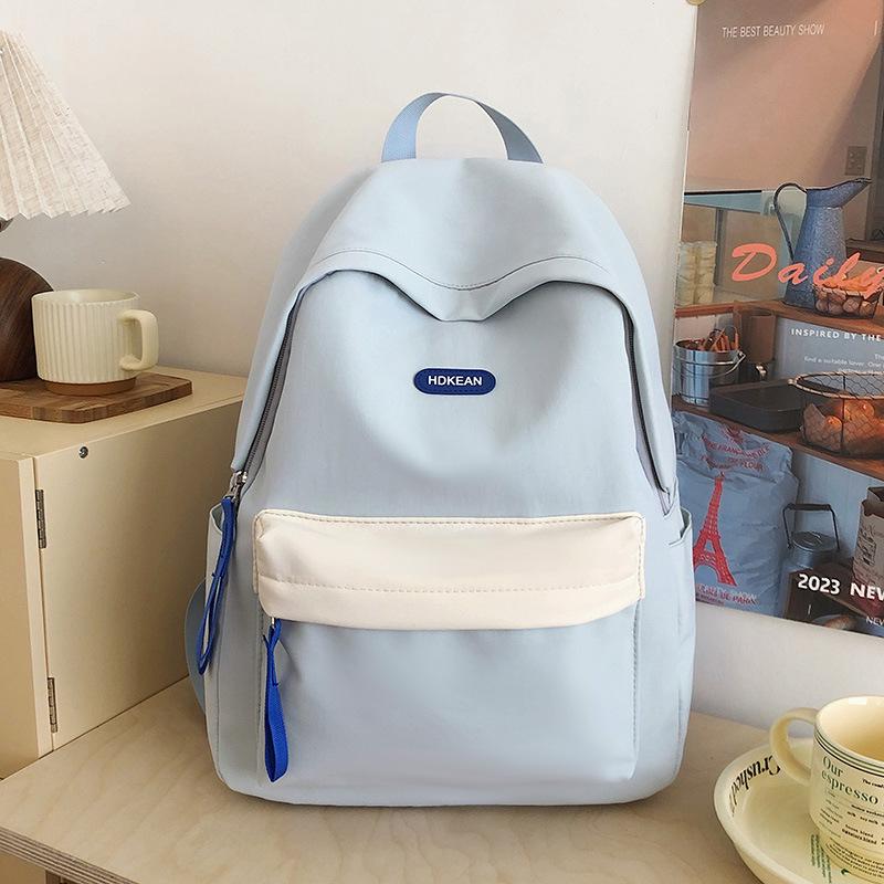 High value, fresh and sweet contrasting color backpack, light and multi-pocket backpack for primary and secondary school students