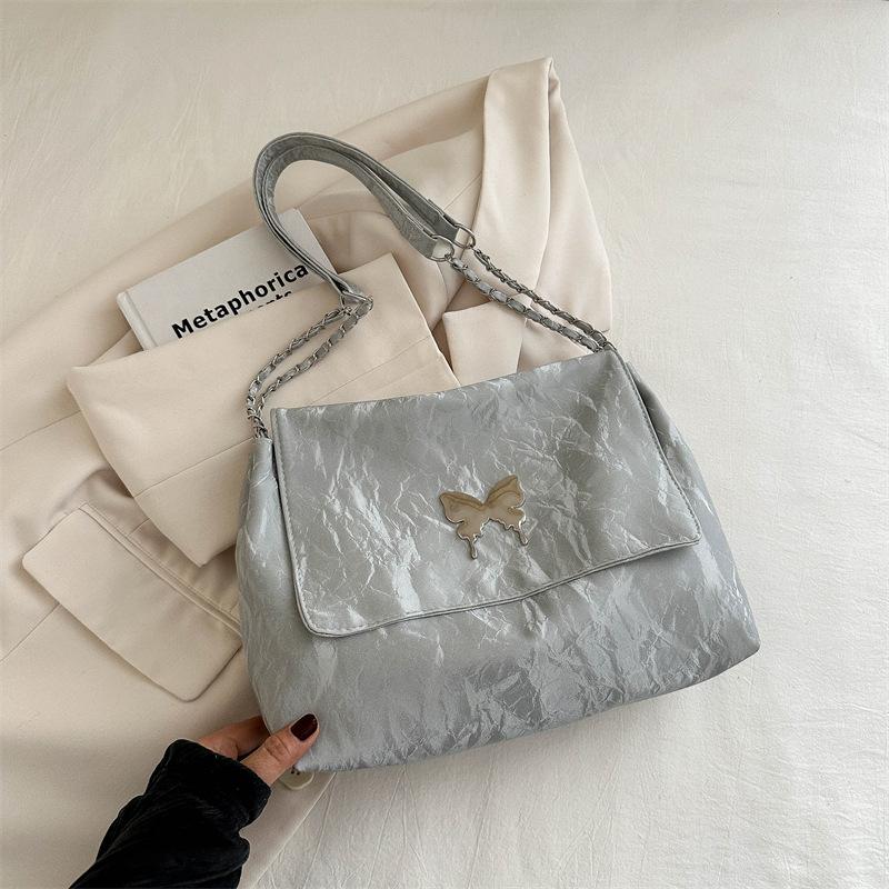 

2025 spring and summer new large-capacity fashion Korean version high-value butterfly shoulder bag women s chain messenger bag temperament серебряный