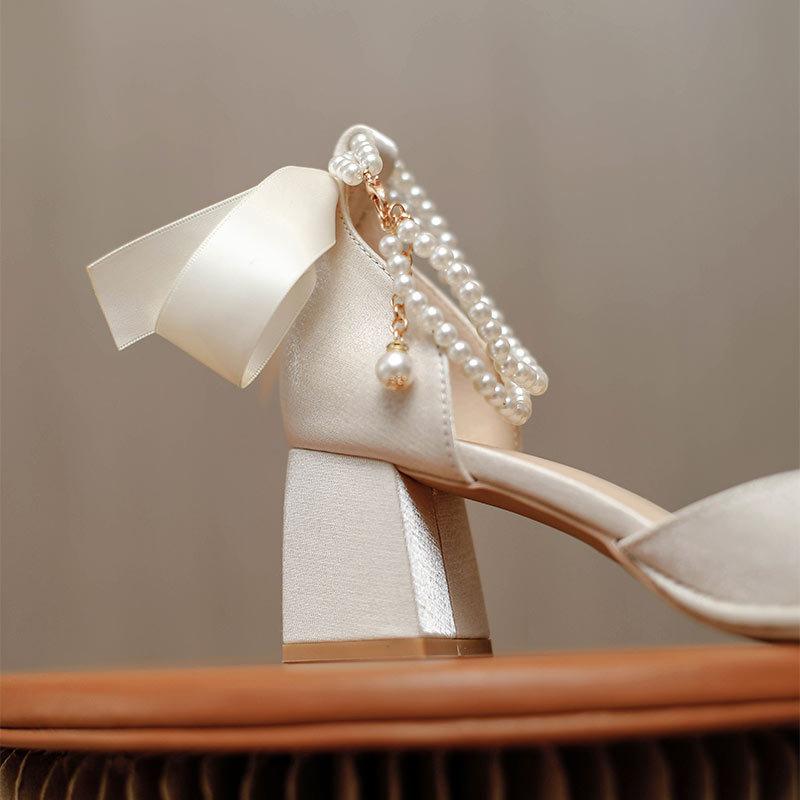 Baotou hollow sandals 2025 new summer square head high heels thick heel red wedding shoes pearl medium heel single shoes