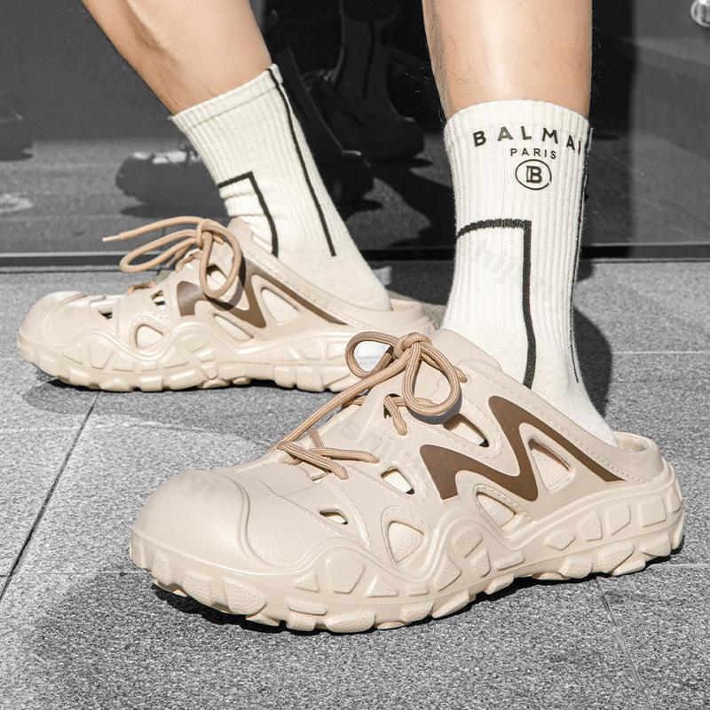 Moda Lato 2025 Nowy Styl Męskie Buty Jaskiniowe Puste Oddychające Kapcie Plażowe Outdoorowe Wygodne Lekkie Modne Casualowe Sandały