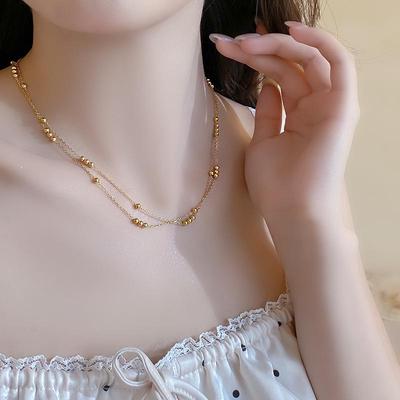 Chic Gold Double-Layer Round Bead Necklace: French Style, High-End Luxury Clavicle Chain for Women