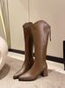 Temperament high tube rear zipper knight boots pointed head medium heel high boots French women's imitation leather thin mouth V thick heel