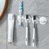 Wall Mounted Self Adhesive Toothpaste Holder Storage Rack Toothpaste Hook for Tidy and Clean Bathrooms