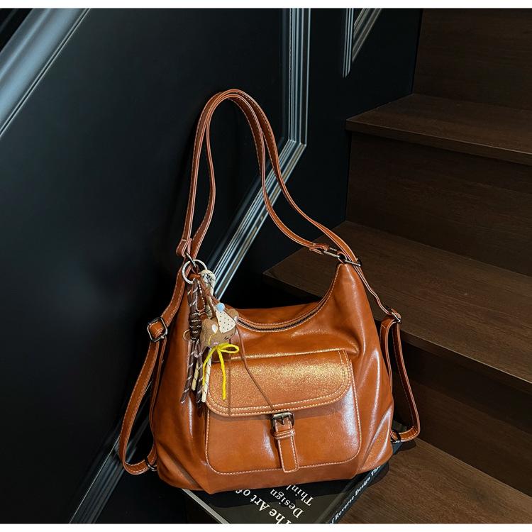 

Ретро сумка через плечо 2025: Вместительный, Многофункциональный, Легкая роскошь, Модный осенний рюкзак Without Pendant жёлтый/коричневый