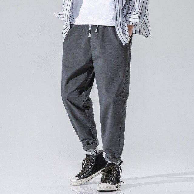

Трендовые брендовые мужские повседневные брюки, мужские модные простые брюки длиной до щиколотки, однотонные брюки гаремы, мужские XXXL серый
