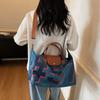 Large capacity short-distance travel bag Women's travel portable tote bag Tide commuter leisure shoulder bag Foreign style messenger bag