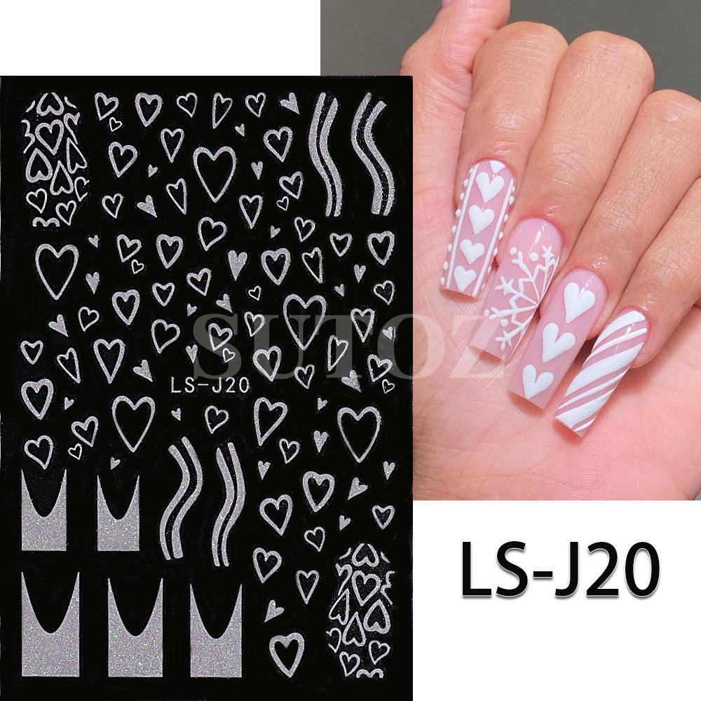 Winterweiße Weihnachts-Nagelsticker: Glitzernde Schneeflocken-, Herz- und Rentierdesigns