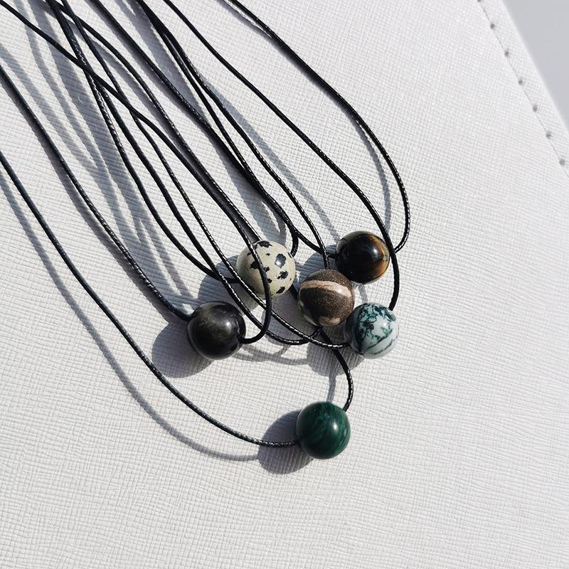 Unisex Retro Geometric Stone Pendant Necklace with Rotating Bead & Leather Cord – Versatile, High-End, Colorfast Design for Women & Men