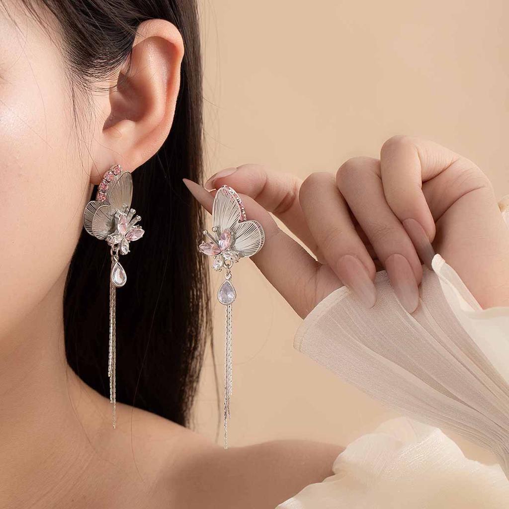 Silver needle super fairy tassel shining pink three-dimensional butterfly stud earrings heavy industry light luxury high sense unique niche earrings
