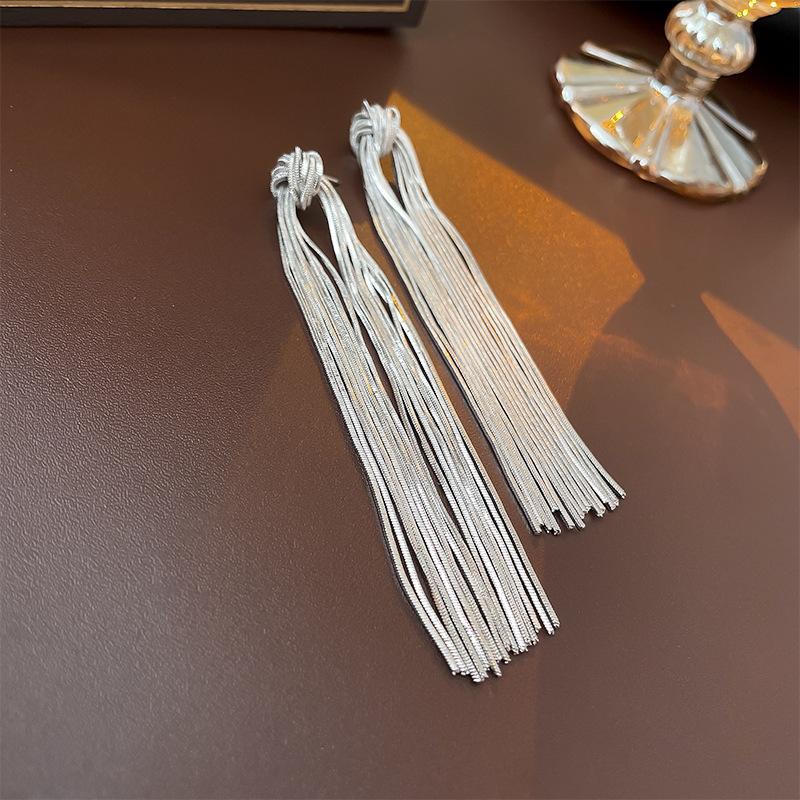 

Elegant knotted metallic brushed long fringed silver needle earrings European and American personalized high-end earrings for