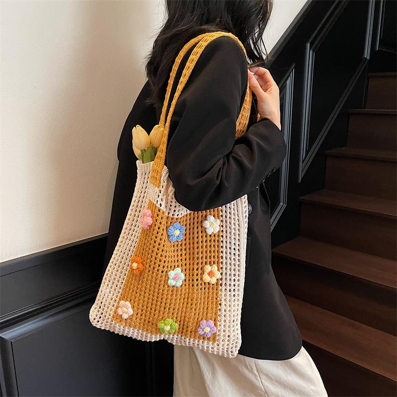 Slack stickad väska med stor kapacitet dam ny pendlar axelväska lat vind ihålig toteväska