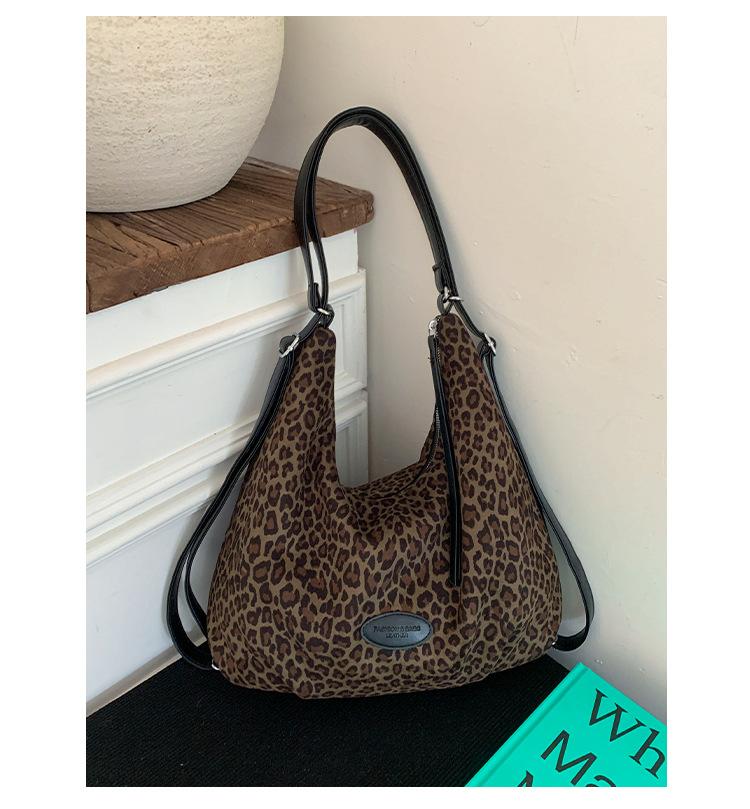 Mode Retro Rucksack Damen 2025 neu große Kapazität Leopardenmuster Tragetasche Pendler Umhängetasche für die Arbeit