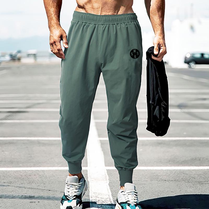 

Muscleguys новое поступление мужские джоггеры спортивные штаны летняя мода фитнес брюки уличная одежда спортивный костюм мужская одежда для спортзала брюки для фитнеса L армия зеленый