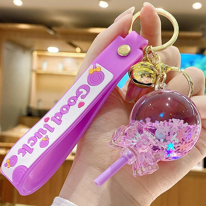 Klíčenka s ozdobou ve tvaru lízátka se sněhovými vločkami a tekutým pískem pro ženy a dívky