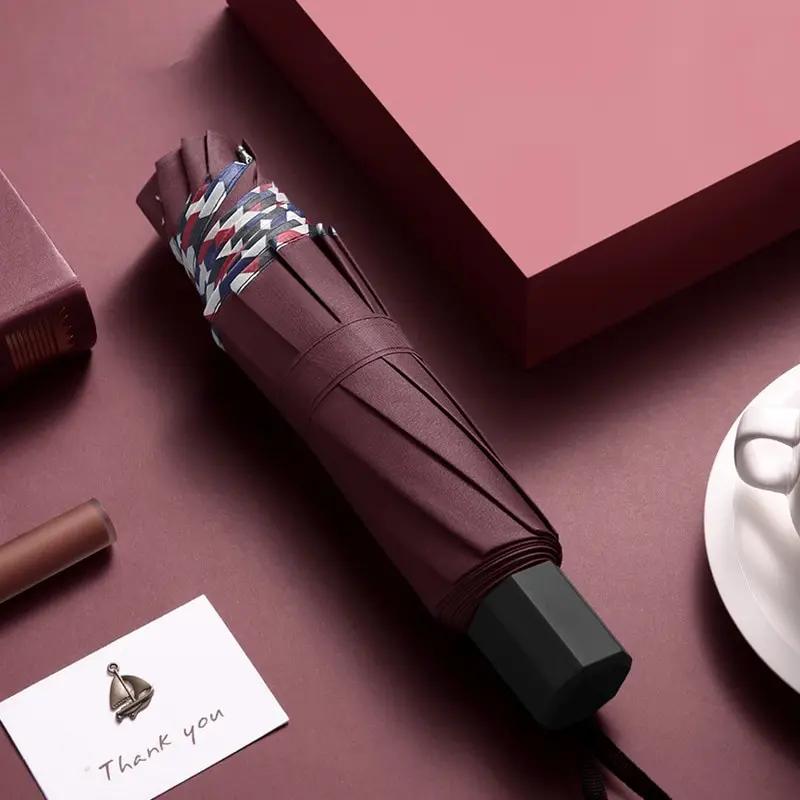 

10-Bone Bumper Cloth Folding Umbrella - Windproof, Rainproof, Dual-Purpose for Sunny & Rainy Days. Ideal for Business and Everyd Iron&10K