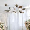 Mid-Century Modern Stilnovo-Inspired 8-Arm Sputnik Chandelier with Curved Disk Shades In Raw Brass, Elegant Light Fixture Dining Room