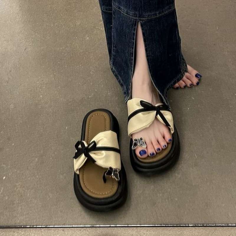 Thick bottom heightening bow toe women's outer wear in summer 2025 new fashion versatile casual beach cool slippers