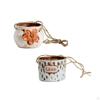 Elegant Hanging Ceramic Planter for Outdoor Spaces