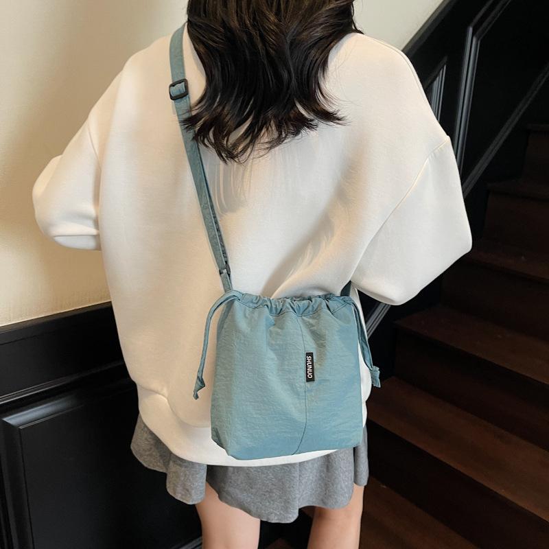 Summer Simple Large-capacity Messenger Bag Drawstring Bucket Bag Shoulder Bag Women's Leisure Commuter Bag