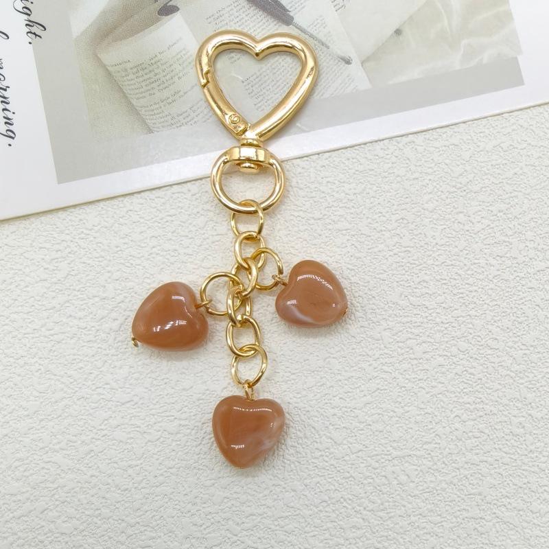 Koreańska Moda Breloczek z Serduszkiem i Smyczka do Telefonu z Zawieszką z Koralików