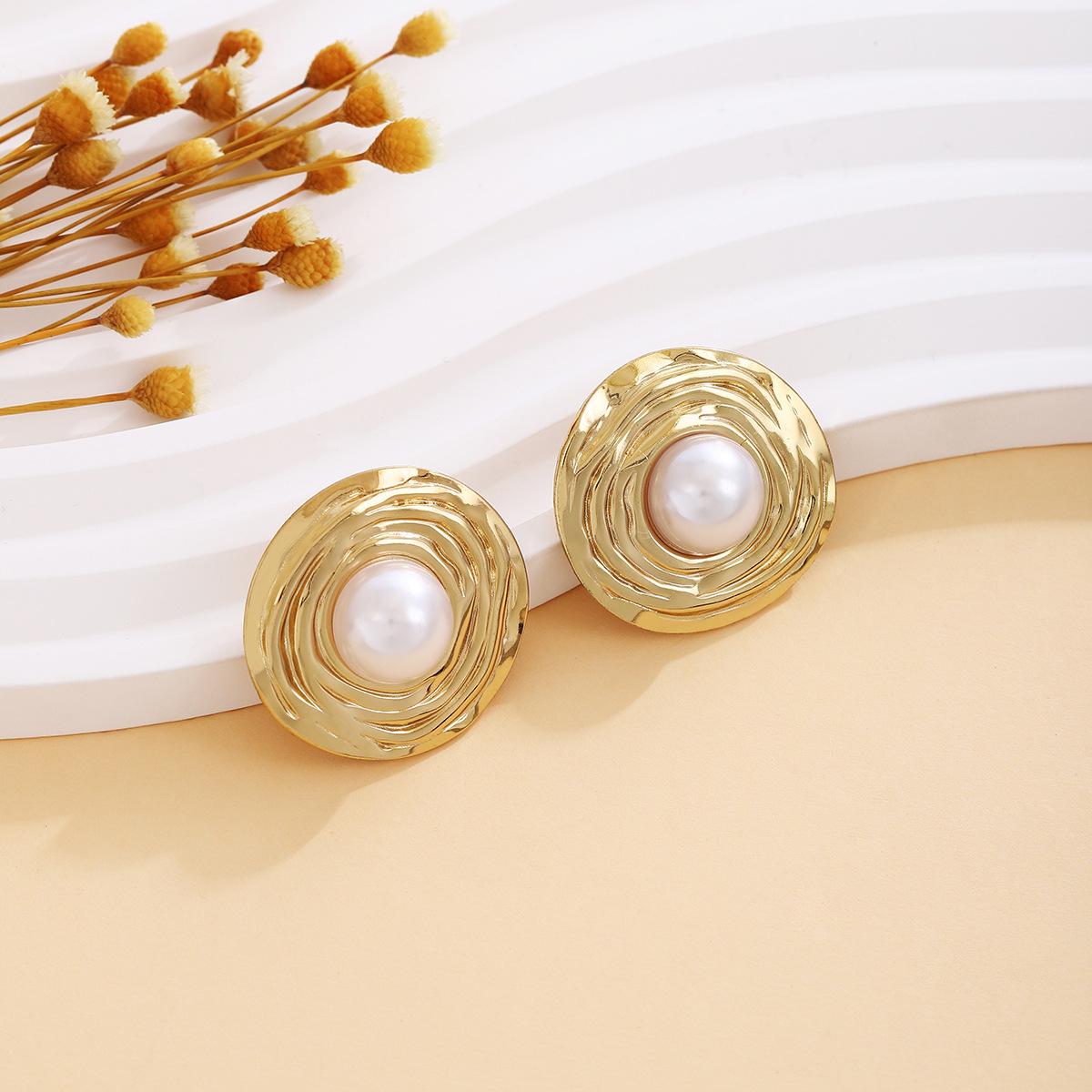 

Elegant Pearl & Bow Earrings: European and American Design, Luxurious Metal Style
