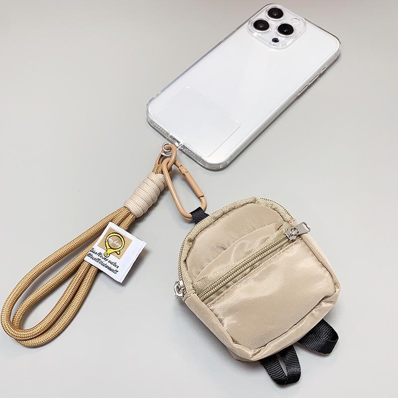 Double-layered small schoolbags, coin purses, phone cases, backpacks, pendants, and earphone covers are all universal