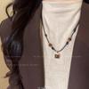 Retro Tiger Eye Stone Sweater Necklace: Versatile Woven Leather Cord for Women, Autumn & Winter