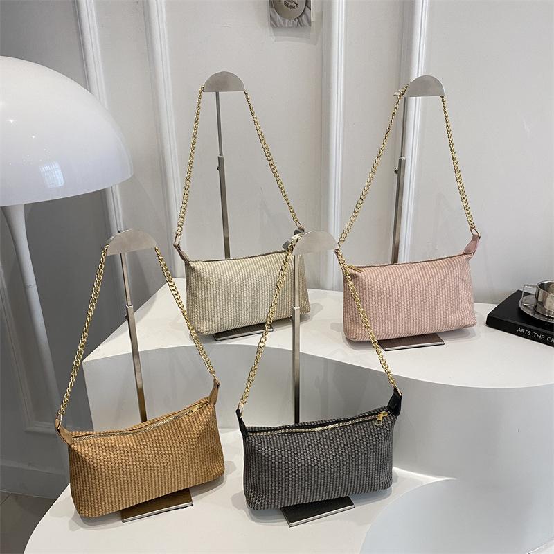 2025 new holiday style straw weaving women's summer popular weaving seaside beach large capacity chain shoulder tote bag