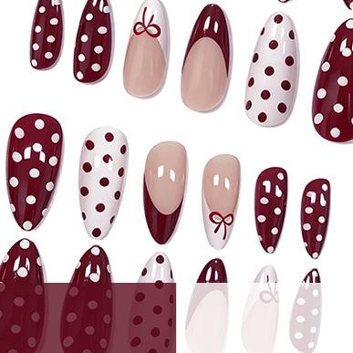 Nail art, French polka dot bow girl style long almond-shaped nail wear