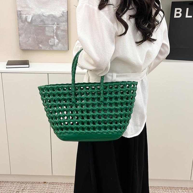 Neue Damenmode Vielseitige Hohle Handtasche mit großem Fassungsvermögen