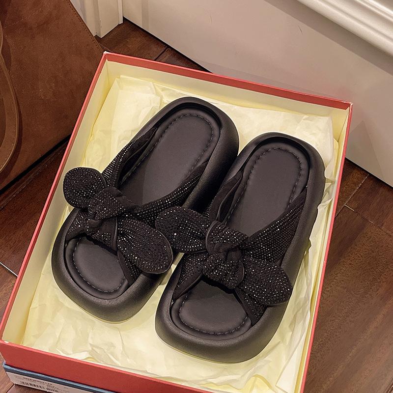 

Fairy rhinestone bow one-word female outer wear 2025 summer temperament versatile sandals thick-soled beach slippers 40