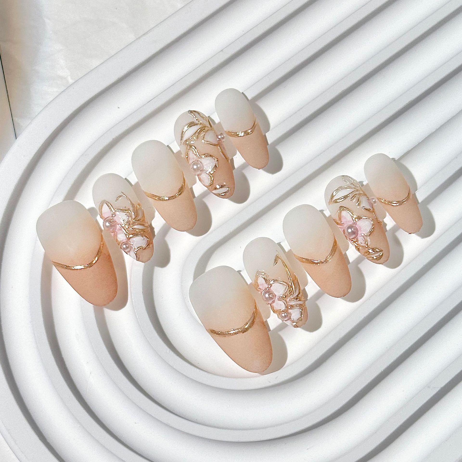 

Medium Length Hand-Painted Oval Matte Fake Nails – Sophisticated Whitening Effect