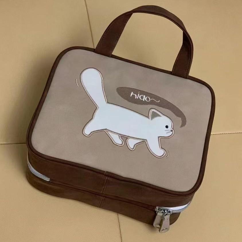 Spacious Cartoon Travel Makeup Bag: Portable, Multi-Compartment, and Three-in-One Design