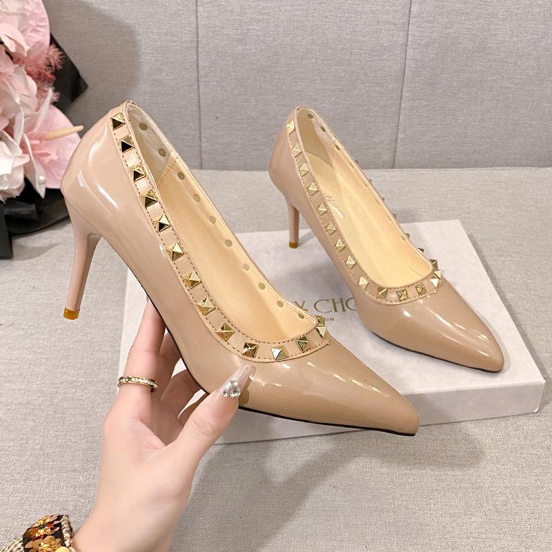 Hong Kong rivet pointed high heels women's spring and summer new fine heel patent leather super high heel temperament single shoes