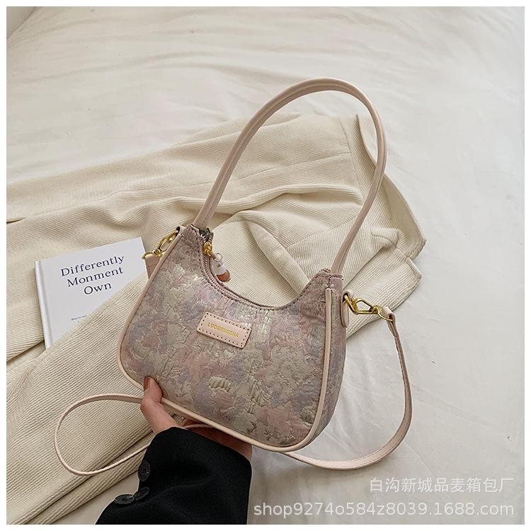 

Popular summer popular armpit small bag women s new 2025 fashion portable flower cloth messenger bag shoulder bag рожевий