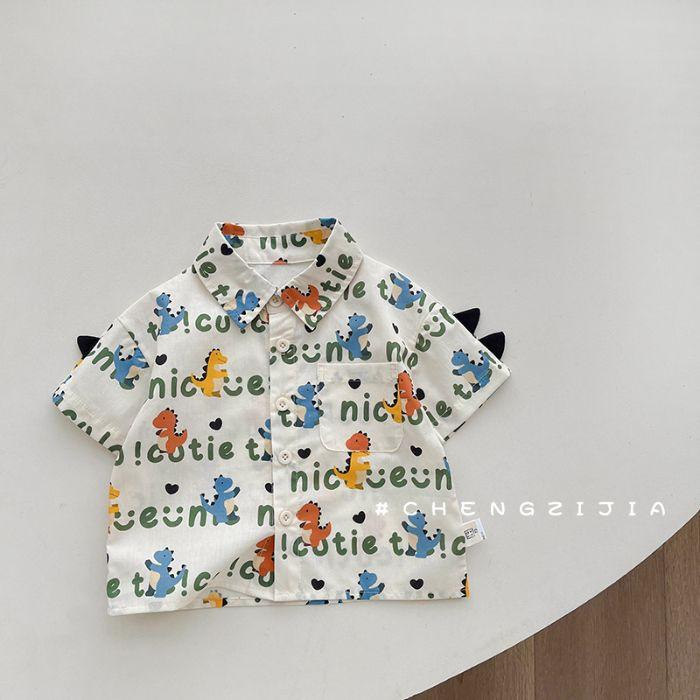 Boys  Four-Way Stretch Printed Short Sleeve Shirt with -Block Collar and Dinosaur Graphic 90